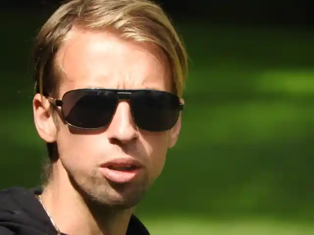 A photo of Jamie posing for a photo at Kearsney Abbey Gardens