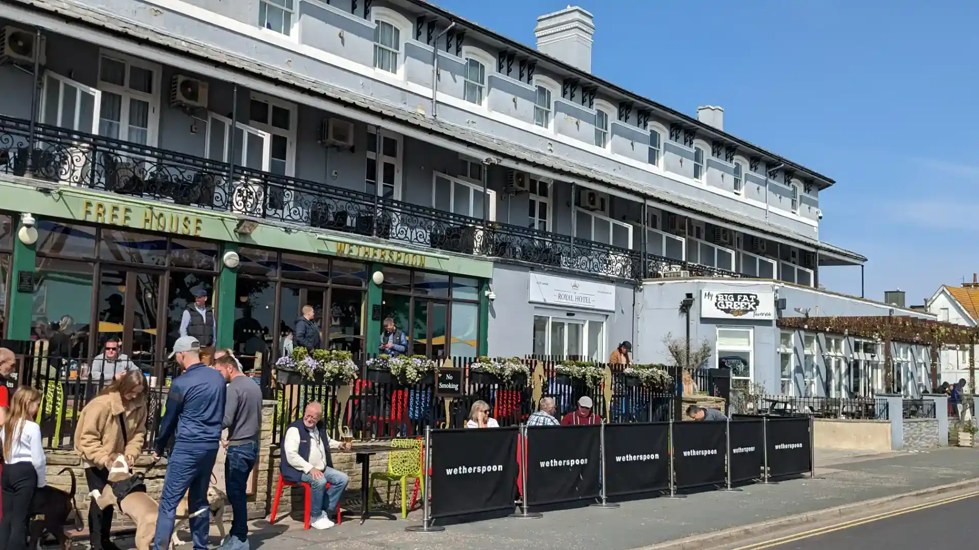 A Sunny Afternoon at a Seafront Pub